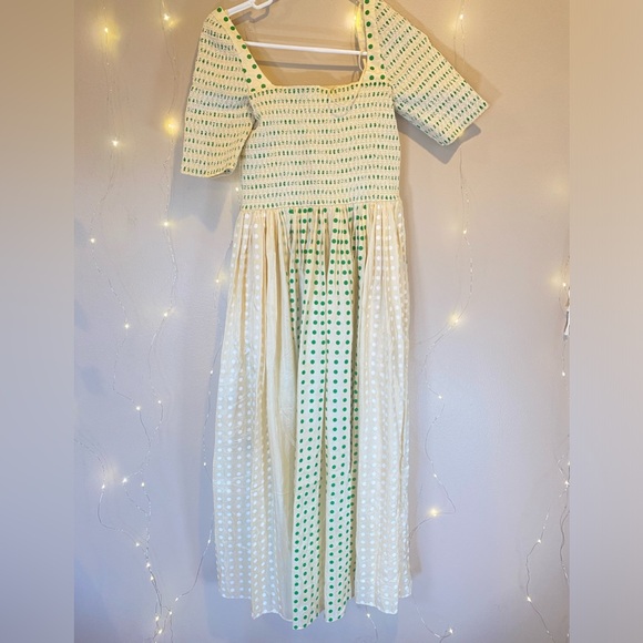 $998 Tory Burch
Silk Dotted Smocked Midi-Dress - Picture 4 of 12